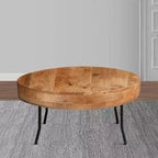 Table basse Royal Hampton, bois de manguier fait main, plateau rond, pieds coudés en métal noir, 81 cm -