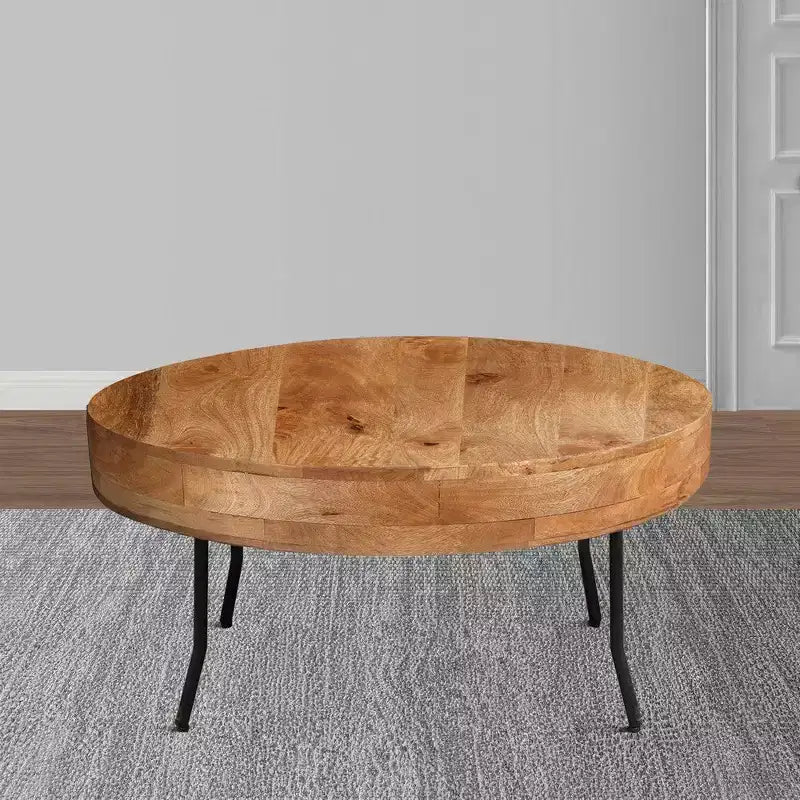 Table basse Royal Hampton, bois de manguier fait main, plateau rond, pieds coudés en métal noir, 81 cm -