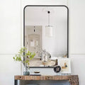 Miroir mural de salle de bain rectangulaire encadré en métal noir 24x36 pouces.