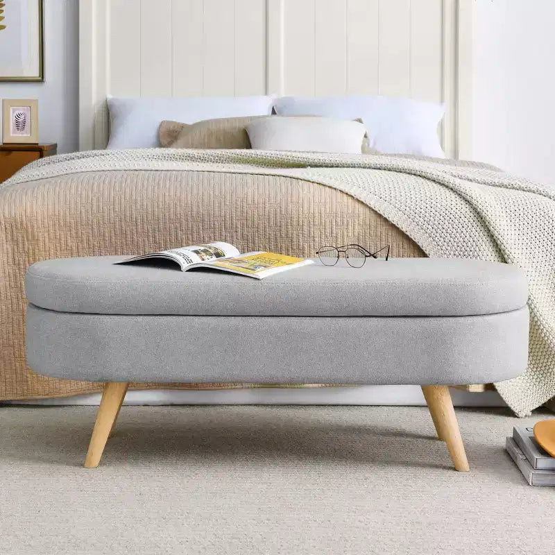 Banc ottoman de rangement ovale Okak Modern en lin avec pieds en bois d'hévéa, long repose-pieds de rangement souple pour salon, entrée, chambre à coucher