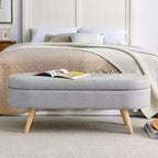 Banc ottoman de rangement ovale Okak Modern en lin avec pieds en bois d'hévéa, long repose-pieds de rangement souple pour salon, entrée, chambre à coucher