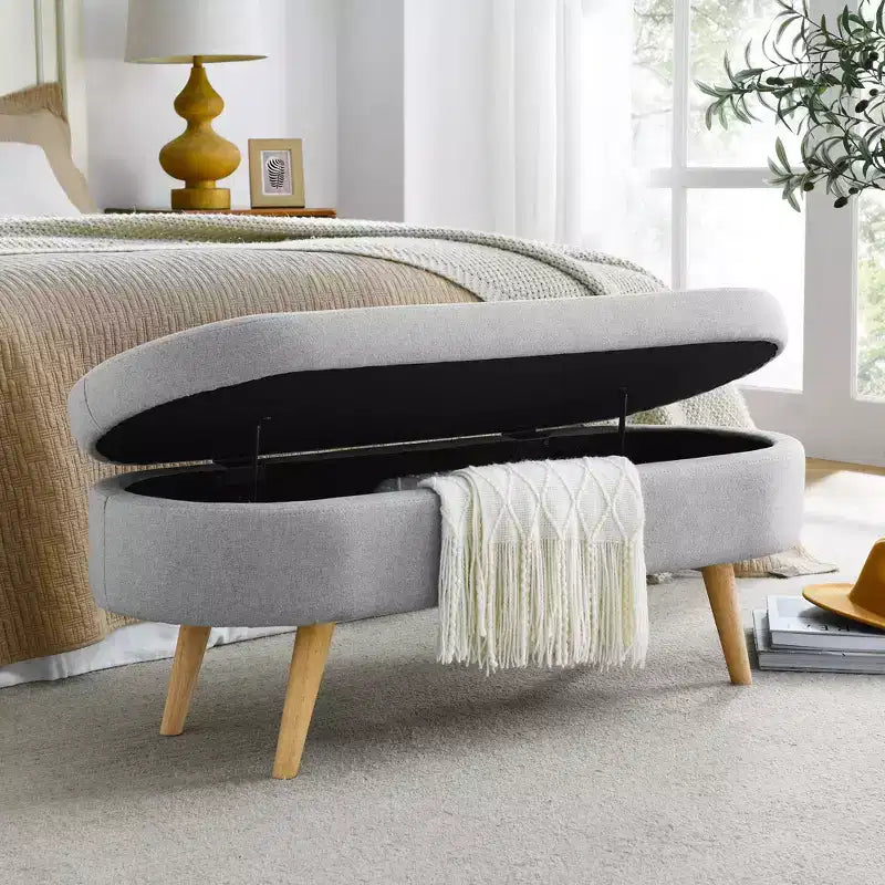 Banc ottoman de rangement ovale Okak Modern en lin avec pieds en bois d'hévéa, long repose-pieds de rangement souple pour salon, entrée, chambre à coucher