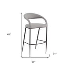 HomeRoots Chaise de bar basse 30" en similicuir et fer gris clair et noir