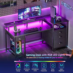 Qwatto Bureau de jeu 132 cm avec station de charge et éclairage, bureau d'ordinateur réversible, 4 tiroirs, meuble de rangement pour dossiers, étagères de rangement pour imprimante, support d'écran, finition noire