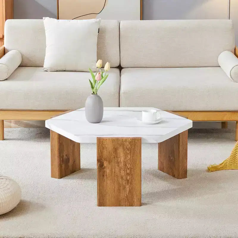 Table basse hexagonale en marbre blanc 31, base triangulaire en panneaux écologiques haute densité supportant jusqu'à 113 kg