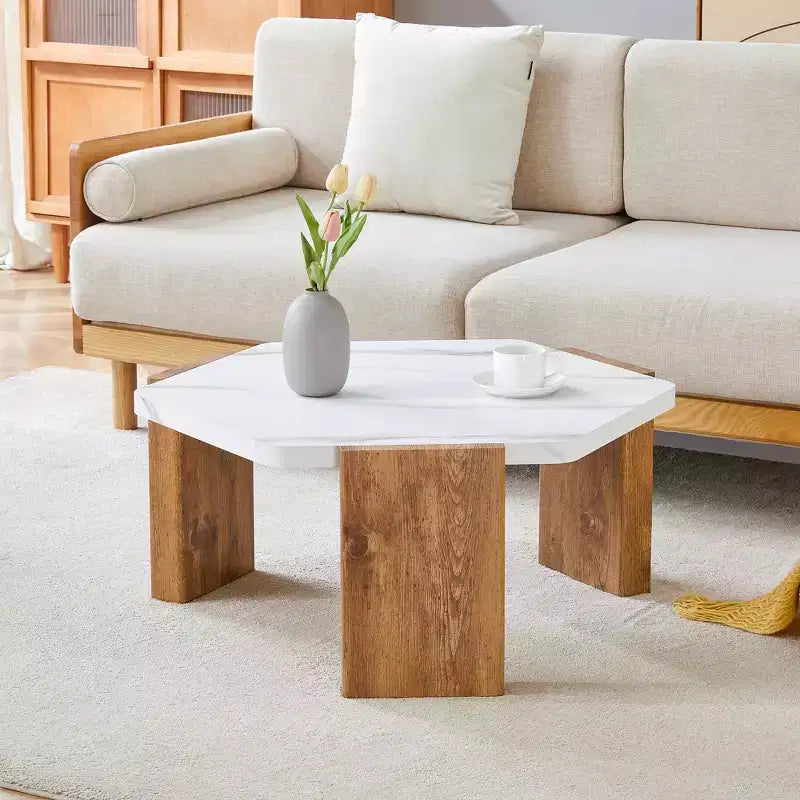 Table basse hexagonale en marbre blanc 31, base triangulaire en panneaux écologiques haute densité supportant jusqu'à 113 kg