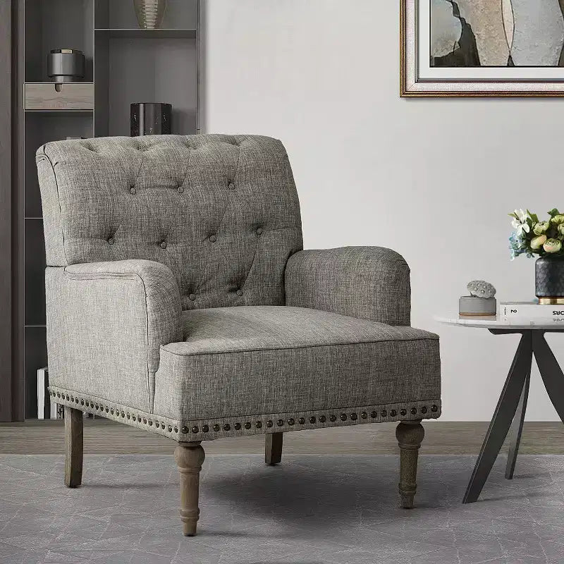 Fauteuil aux pieds sculptés - Gris